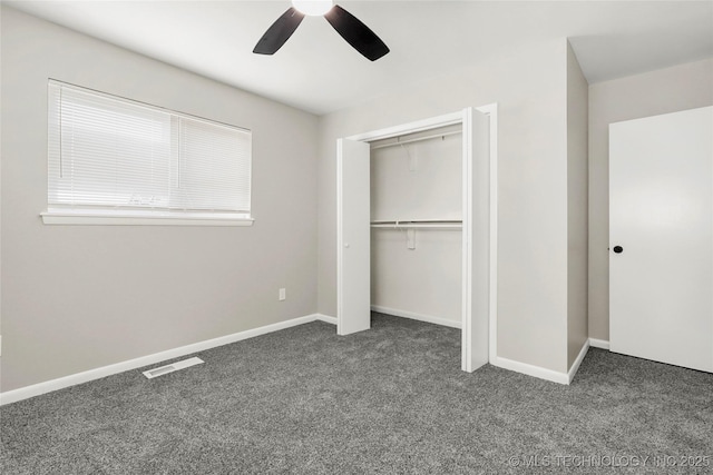 11607 E 24th St, Tulsa, OK 74129 - unfurnished bedroom with carpet, a closet, ceiling fan, and baseboards