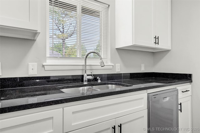 11607 E 24th St, Tulsa, OK 74129 - kitchen featuring dishwasher, a sink, white cabinets, and dark stone counters