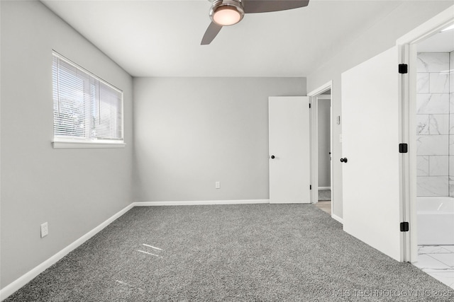11607 E 24th St, Tulsa, OK 74129 - unfurnished bedroom with baseboards, a ceiling fan, and carpet floors