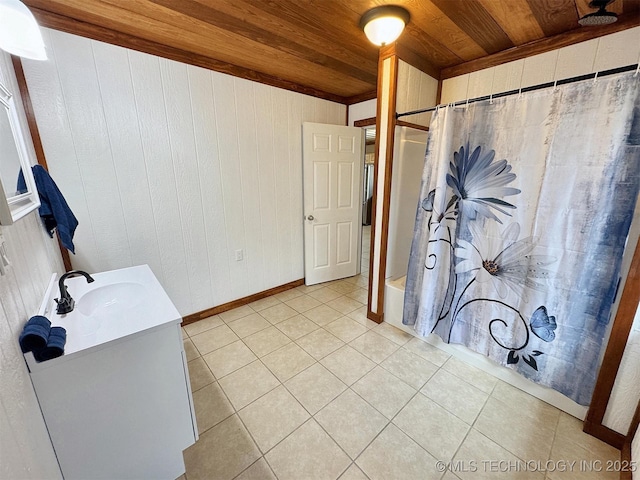 15588 N Sunset Valley Rd, Hulbert, OK 74441 - bathroom with wood ceiling, vanity, tile patterned flooring, wood walls, and baseboards
