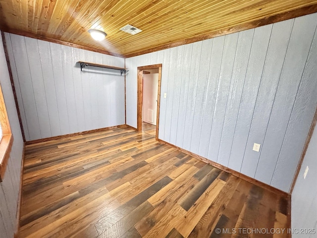 15588 N Sunset Valley Rd, Hulbert, OK 74441 - unfurnished bedroom featuring wood finished floors, wooden walls, wooden ceiling, and baseboards