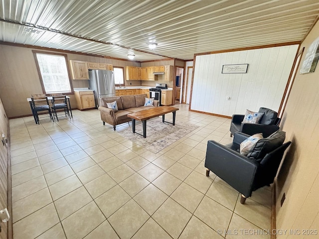 15588 N Sunset Valley Rd, Hulbert, OK 74441 - living room with light tile patterned flooring, wood walls, and baseboards