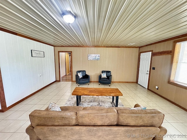 15588 N Sunset Valley Rd, Hulbert, OK 74441 - living room featuring light tile patterned flooring, wood walls, and baseboards