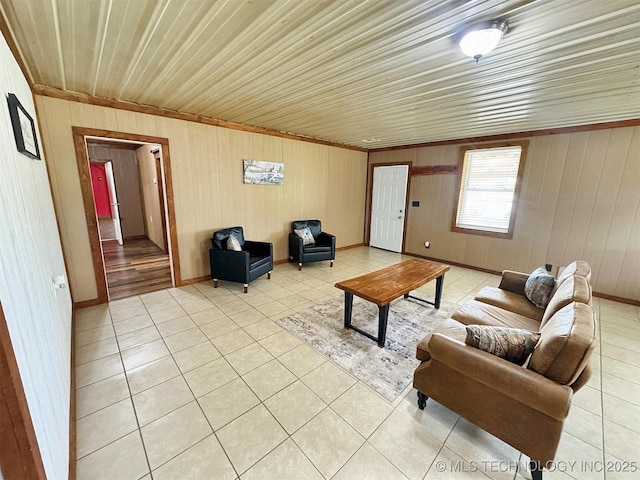 15588 N Sunset Valley Rd, Hulbert, OK 74441 - living room with light tile patterned floors, wood walls, wood ceiling, and baseboards