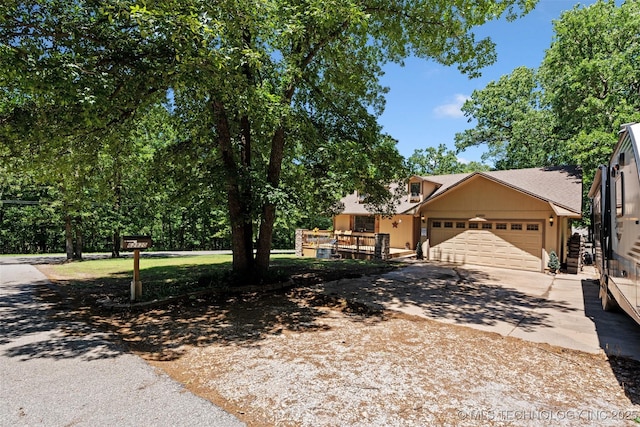 62820 E 312th Rd, Grove, OK 74344 - view of front of house with an attached garage and concrete driveway