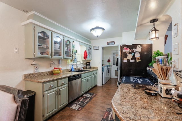62820 E 312th Rd, Grove, OK 74344 - kitchen featuring stainless steel dishwasher, a sink, freestanding refrigerator, dark wood-type flooring, and glass insert cabinets