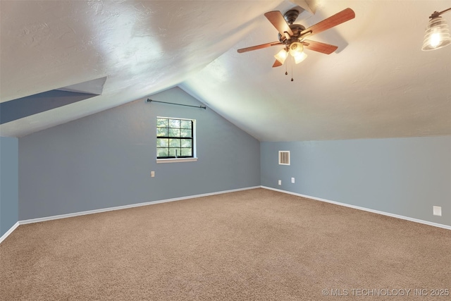 62820 E 312th Rd, Grove, OK 74344 - additional living space featuring carpet flooring, vaulted ceiling, and baseboards