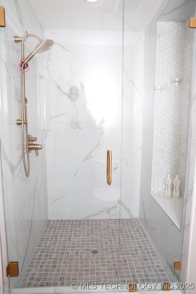 2233 E 32nd St, Tulsa, OK 74105 - full bathroom featuring a marble finish shower