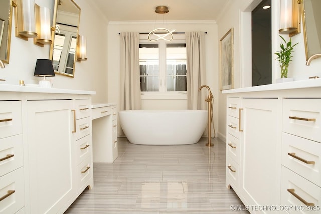 2233 E 32nd St, Tulsa, OK 74105 - bathroom with vanity, a soaking tub, and crown molding