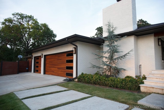 2233 E 32nd St, Tulsa, OK 74105 - garage with concrete driveway