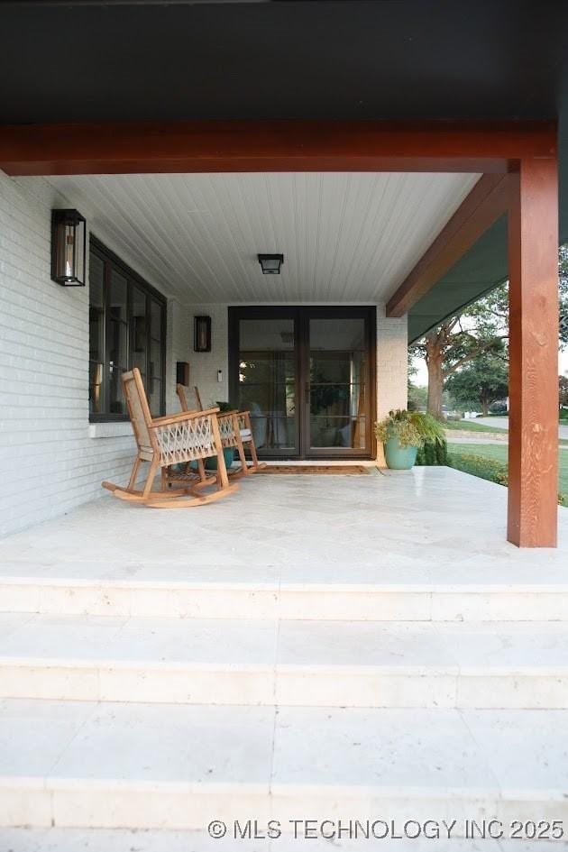 2233 E 32nd St, Tulsa, OK 74105 - view of covered porch