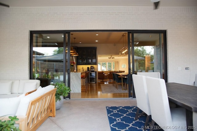2233 E 32nd St, Tulsa, OK 74105 - view of patio / terrace with outdoor dining area, an outdoor hangout area, and wine cooler