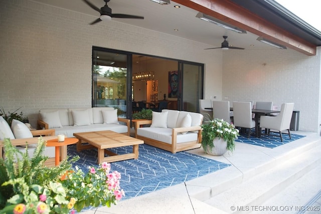 2233 E 32nd St, Tulsa, OK 74105 - view of patio / terrace featuring a ceiling fan, an outdoor hangout area, and outdoor dining area