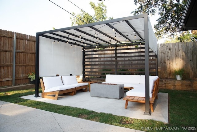 2233 E 32nd St, Tulsa, OK 74105 - fenced backyard featuring an outdoor living space with a fire pit and a patio