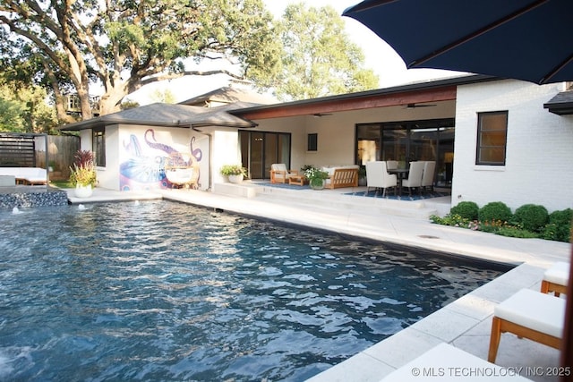 2233 E 32nd St, Tulsa, OK 74105 - outdoor pool with ceiling fan and a patio