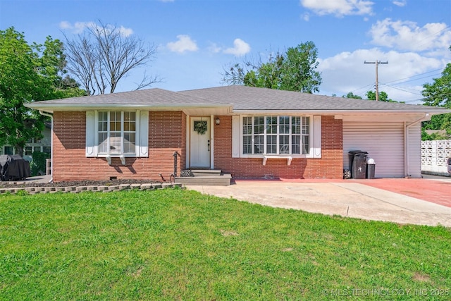 303 SE 3rd St, Pryor, OK 74361 - ranch-style house with an attached garage, brick siding, a front yard, and driveway