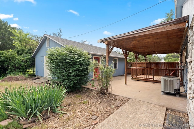1558 E N Ridge Dr, Vinita, OK 74301 - view of patio featuring central AC and a deck