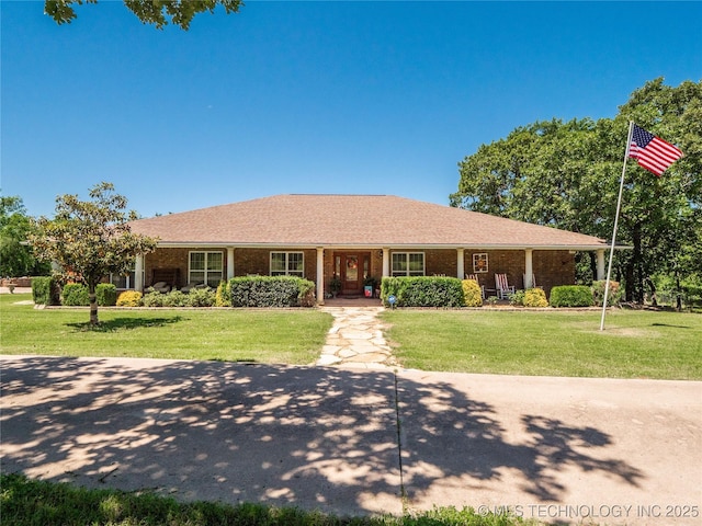 20 Quail, Mcalester, OK 74501 - ranch-style house featuring a front lawn, a porch, and brick siding