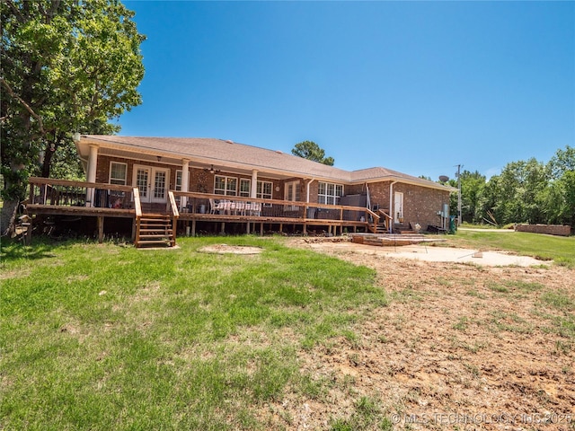 20 Quail, Mcalester, OK 74501 - back of property with french doors, a deck, a yard, and brick siding