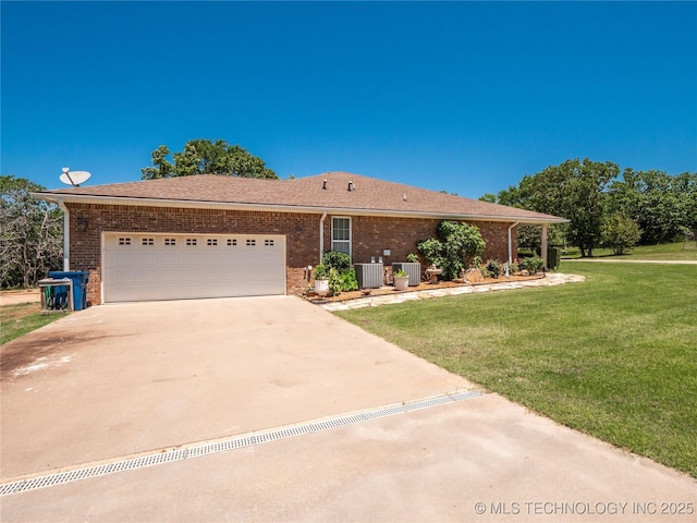 20 Quail, Mcalester, OK 74501 - single story home with brick siding, concrete driveway, a front lawn, and a garage