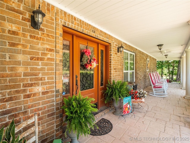 20 Quail, Mcalester, OK 74501 - property entrance featuring covered porch and brick siding
