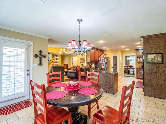 20 Quail, Mcalester, OK 74501 - dining room with a chandelier, stone tile floors, crown molding, and recessed lighting