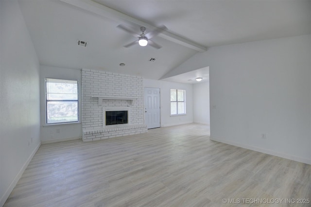 1904 W Honolulu St, Broken Arrow, OK 74012 - unfurnished living room with a ceiling fan, light wood-style floors, a brick fireplace, and baseboards
