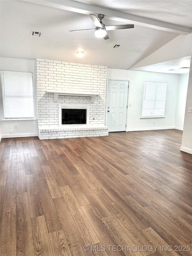1904 W Honolulu St, Broken Arrow, OK 74012 - unfurnished living room featuring a ceiling fan, wood finished floors, baseboards, and a brick fireplace