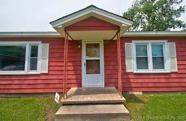 4120 W 53rd St S, Muskogee, OK 74401 - doorway to property featuring a lawn