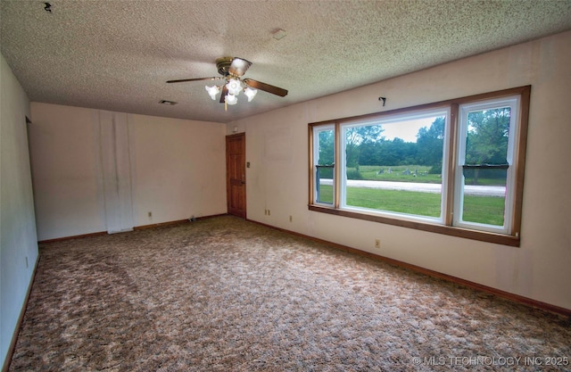 4120 W 53rd St S, Muskogee, OK 74401 - carpeted empty room with a ceiling fan, a textured ceiling, and baseboards