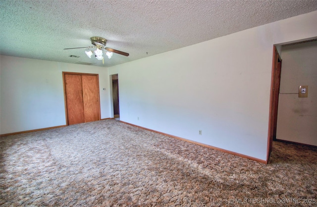 4120 W 53rd St S, Muskogee, OK 74401 - unfurnished bedroom with carpet floors, a closet, baseboards, and a textured ceiling