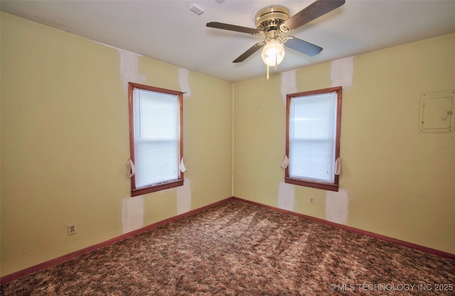 4120 W 53rd St S, Muskogee, OK 74401 - spare room with carpet flooring, ceiling fan, electric panel, and baseboards