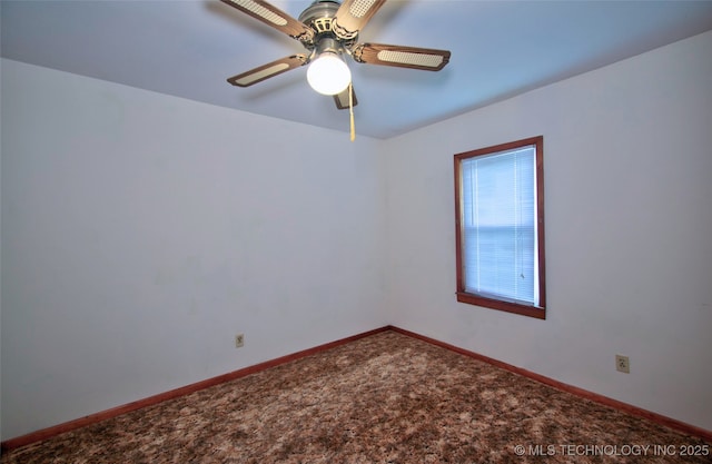 4120 W 53rd St S, Muskogee, OK 74401 - spare room with a ceiling fan, baseboards, and carpet