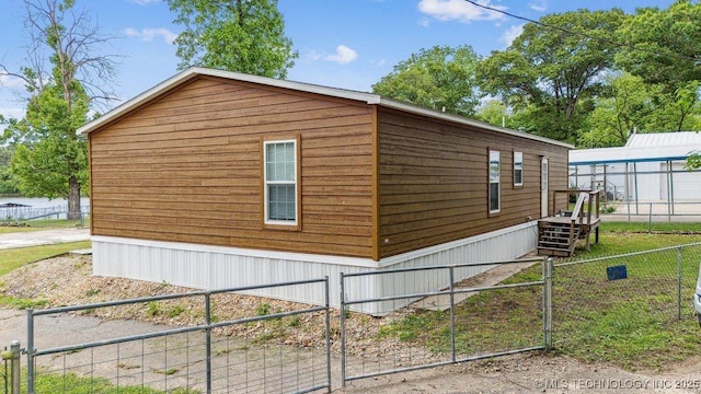 150 Private Road 121, Eucha, OK 74342 - view of side of home featuring a gate
