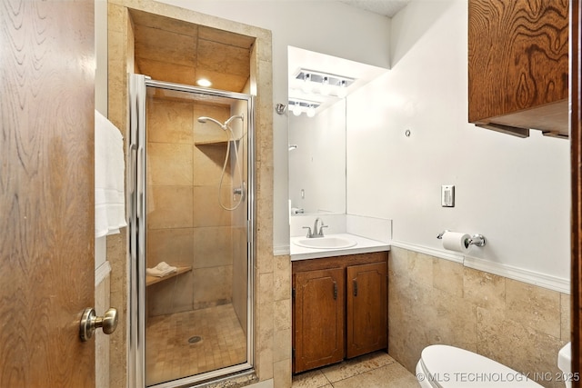 73645 Cyclone Cir, Wagoner, OK 74467 - full bathroom featuring vanity, a stall shower, toilet, and tile patterned flooring