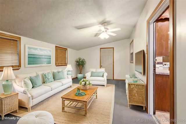 73645 Cyclone Cir, Wagoner, OK 74467 - living area with ceiling fan, lofted ceiling, and a textured ceiling