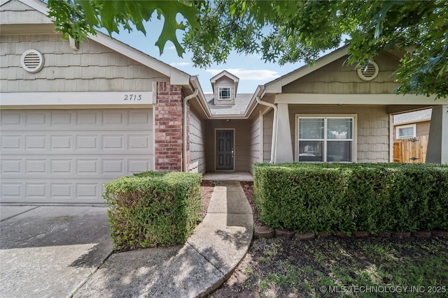 2713 N 20th St, Broken Arrow, OK 74012 - ranch-style house with concrete driveway and an attached garage