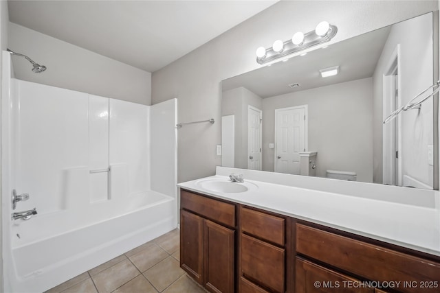 2713 N 20th St, Broken Arrow, OK 74012 - bathroom with tile patterned floors, vanity, shower / bath combination, and toilet