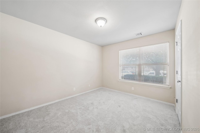 2713 N 20th St, Broken Arrow, OK 74012 - carpeted empty room featuring baseboards