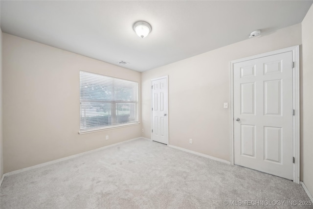 2713 N 20th St, Broken Arrow, OK 74012 - unfurnished bedroom featuring carpet flooring, baseboards, and a closet