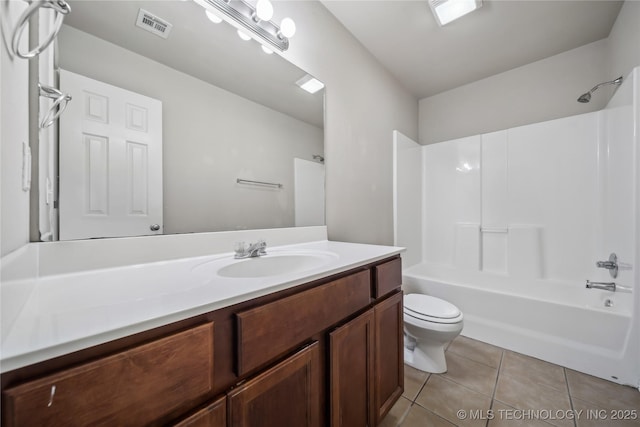 2713 N 20th St, Broken Arrow, OK 74012 - bathroom with vanity, toilet, tile patterned flooring, and shower / tub combination
