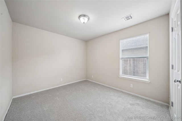2713 N 20th St, Broken Arrow, OK 74012 - carpeted spare room featuring baseboards