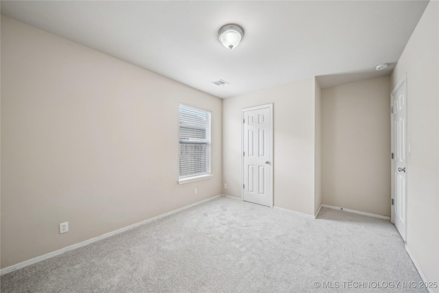 2713 N 20th St, Broken Arrow, OK 74012 - unfurnished bedroom featuring light colored carpet and baseboards