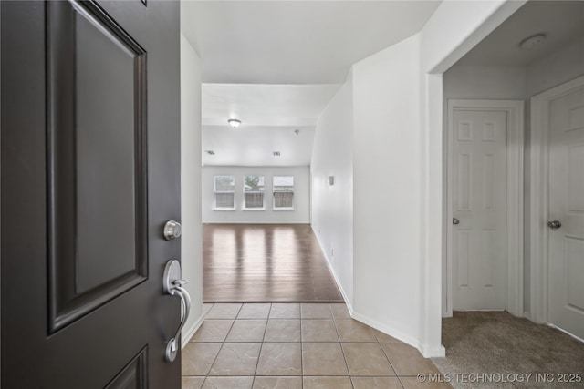 2713 N 20th St, Broken Arrow, OK 74012 - foyer featuring baseboards and light tile patterned flooring