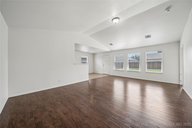 2713 N 20th St, Broken Arrow, OK 74012 - unfurnished living room featuring vaulted ceiling, wood finished floors, and baseboards