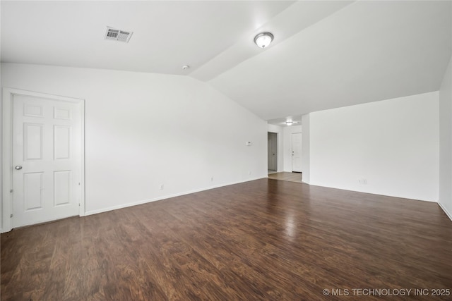 2713 N 20th St, Broken Arrow, OK 74012 - unfurnished room featuring vaulted ceiling, wood finished floors, and baseboards