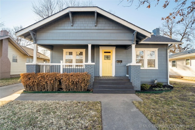 1232 S Gary Pl, Tulsa, OK 74104 - bungalow-style home with covered porch and a chimney
