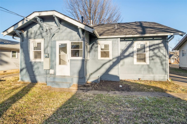 1232 S Gary Pl, Tulsa, OK 74104 - rear view of property with roof with shingles and a lawn