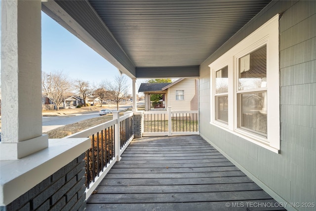 1232 S Gary Pl, Tulsa, OK 74104 - view of wooden porch