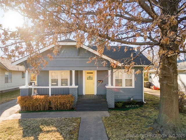 1232 S Gary Pl, Tulsa, OK 74104 - bungalow-style home featuring a porch